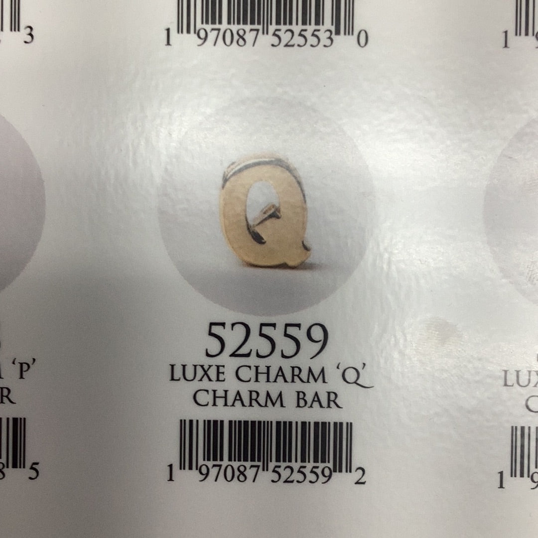 Q Charm