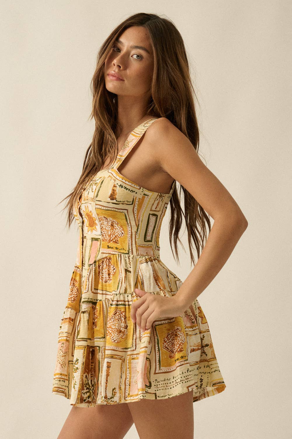 Tropical-Print Sleeveless Button-Front Tiered Ruffle Romper