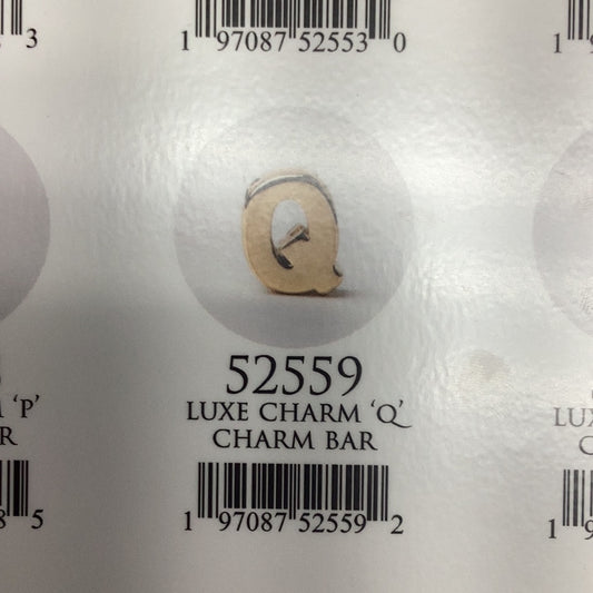 Q Charm
