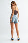 Amber Mid Rise Stretch Short In Light Denim