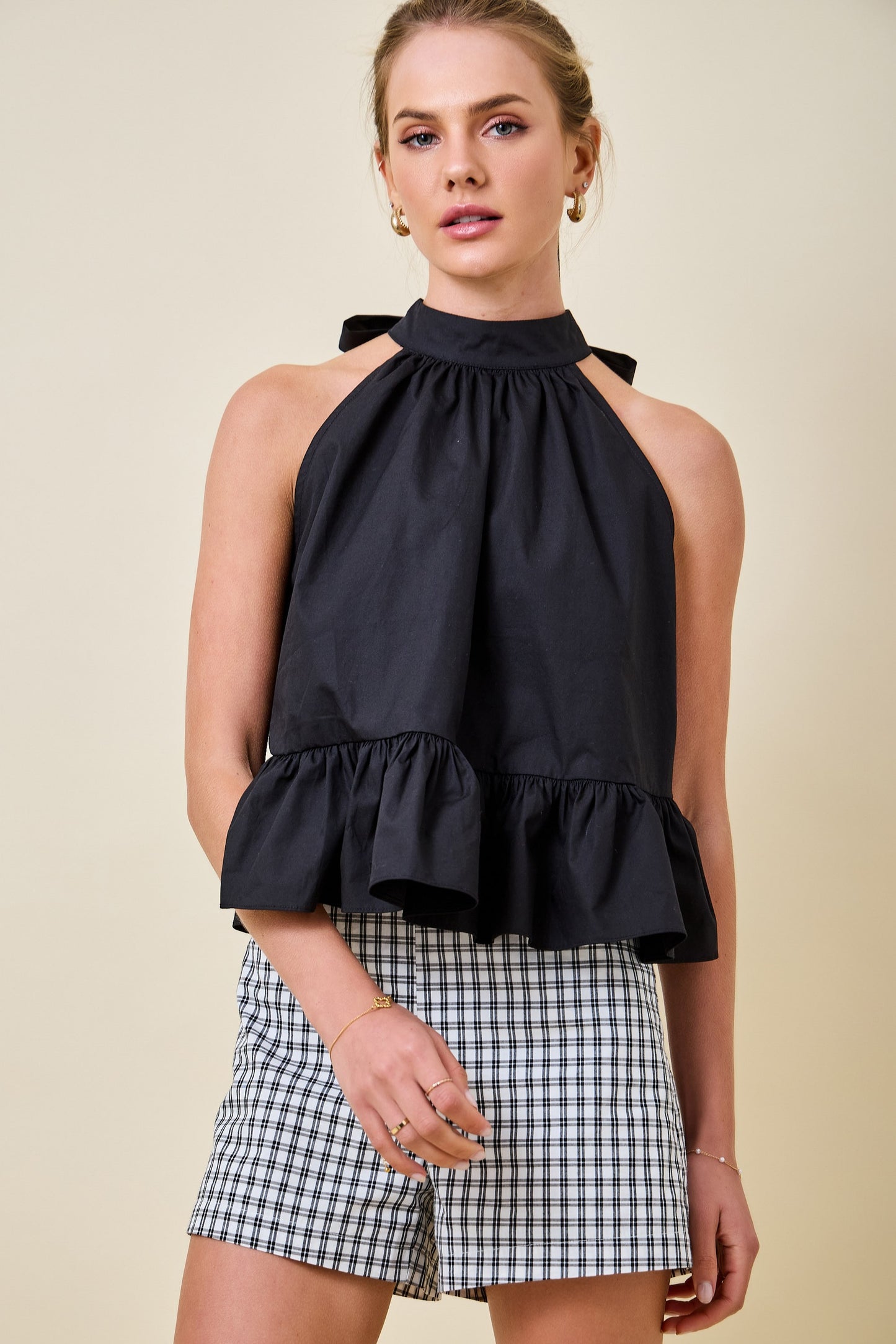 Halter Neck Gathered Peplum Top with Back Tie Detail in Black